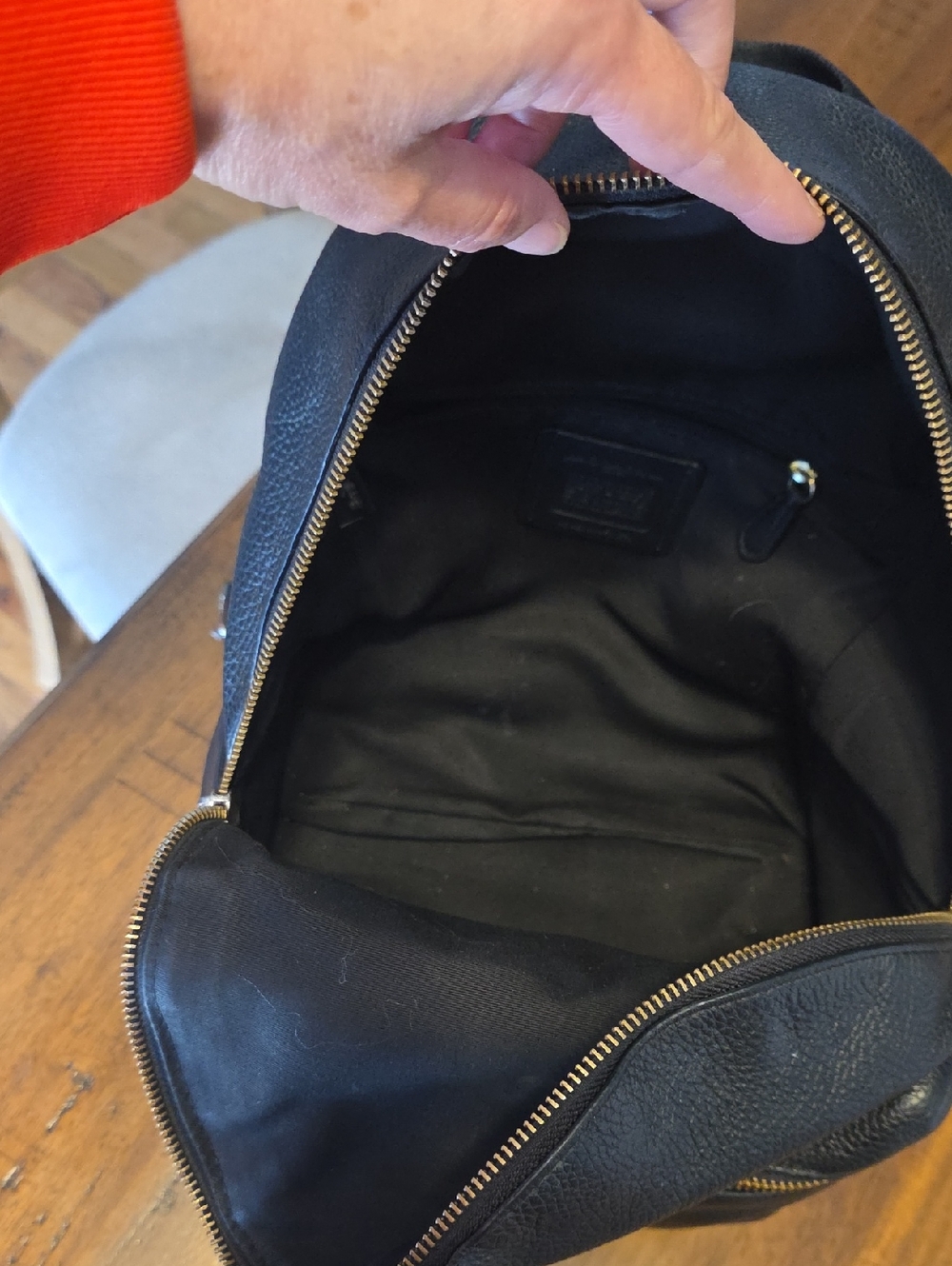 Coach Medium Charlie Backpack in black pebbled leather. - Picture 13 of 16